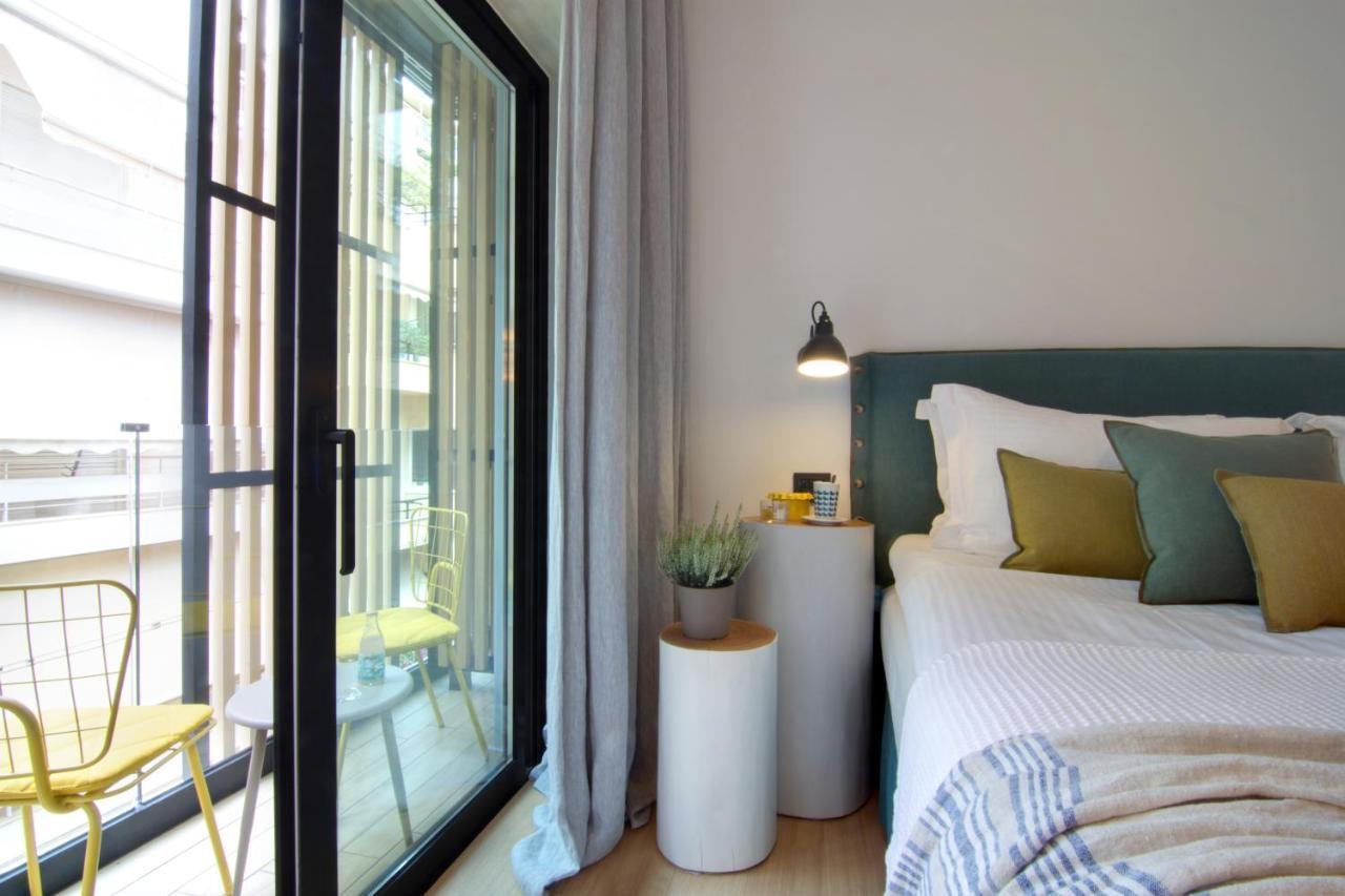 Hotel Coco-Mat Athens Jumelle Exteriér fotografie A bedroom at the hotel