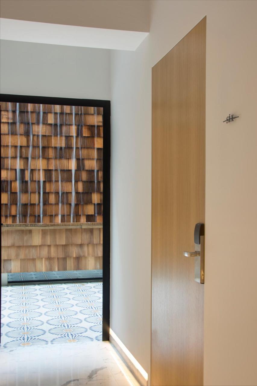 Hotel Coco-Mat Athens Jumelle Exteriér fotografie A door with a water curtain